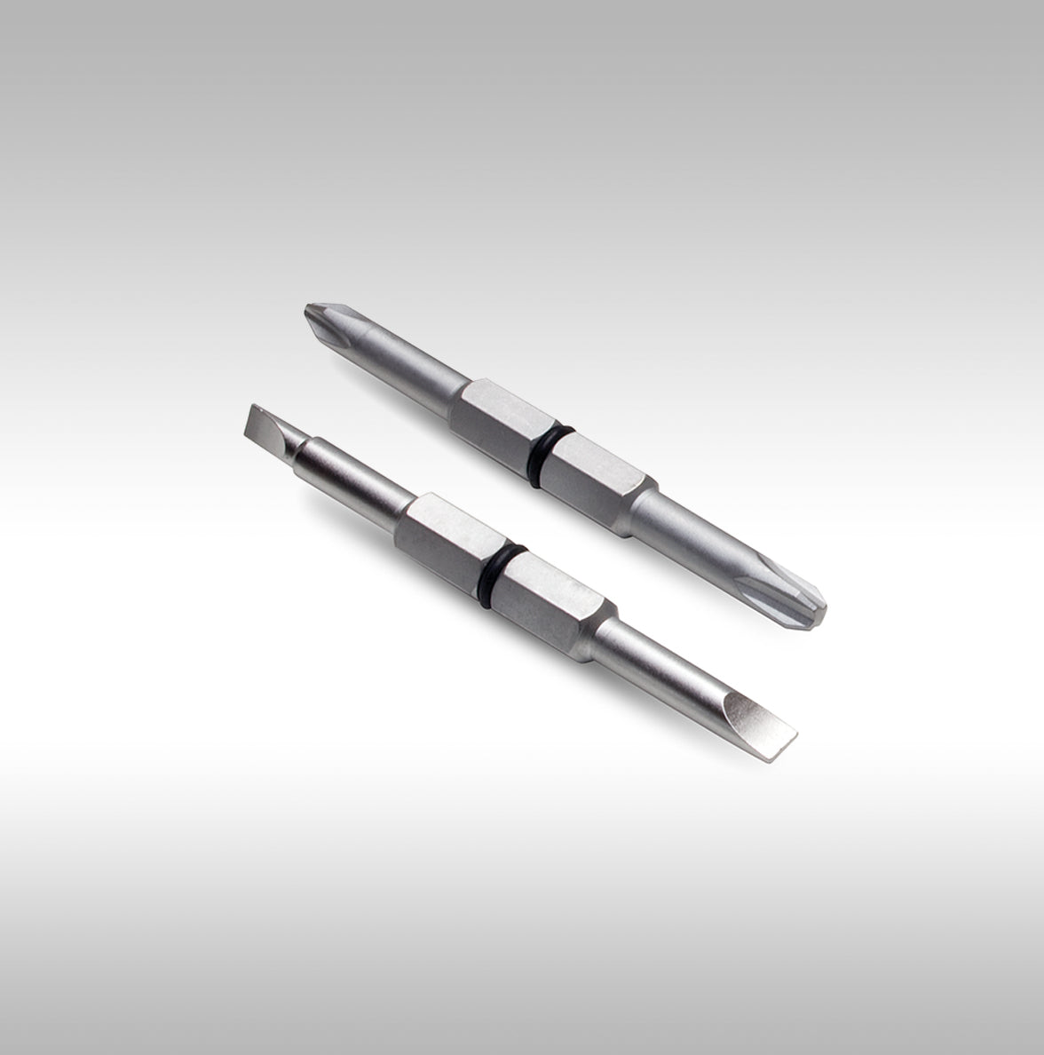 Motion Pro Tools bit set. Two bits with two tips each for a total of 4 tools. Phillips #2 and Phillips #3. Slotted ends small and medium. Work great with the MP Tool Metric.