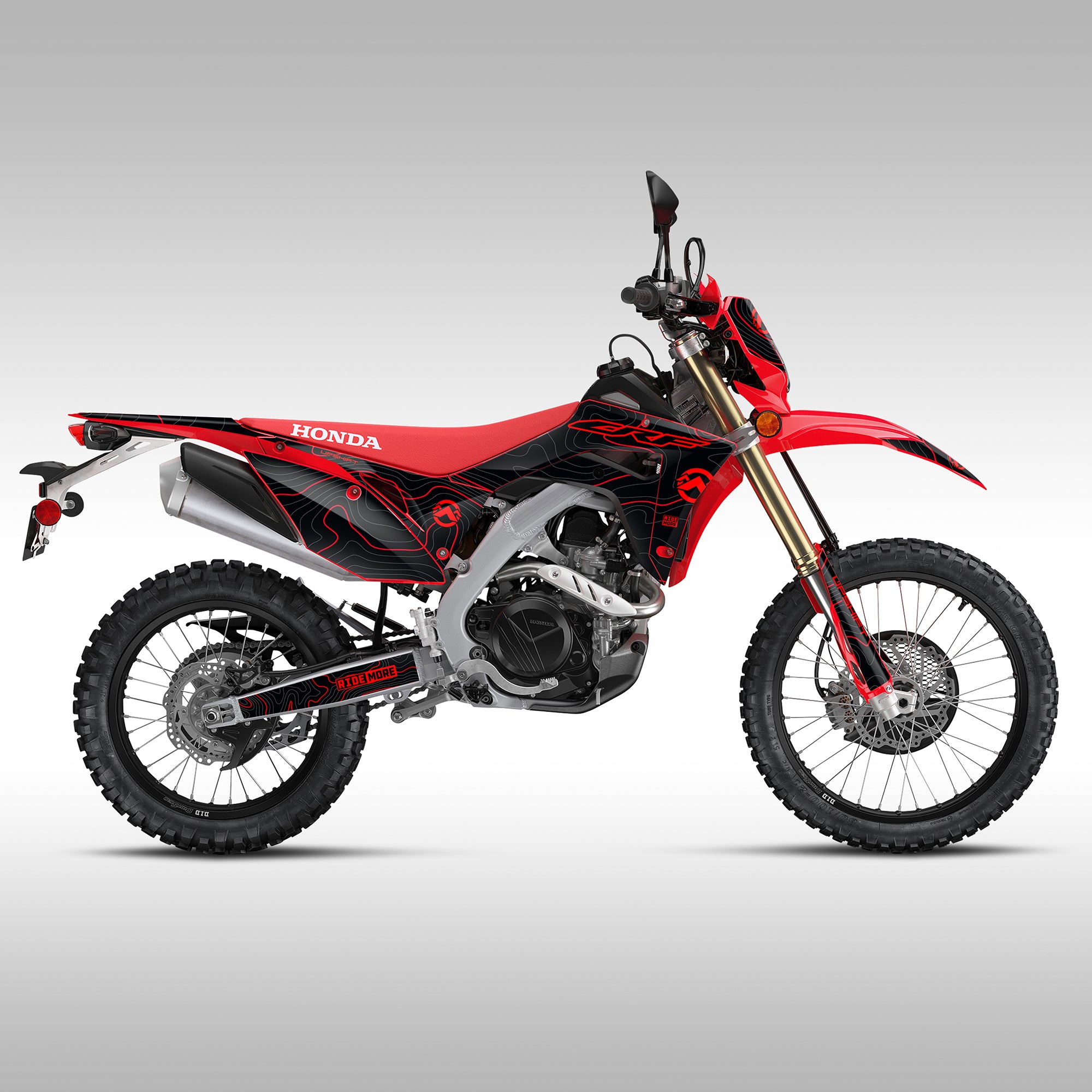 Side view of a Honda CRF450L / CRF450RL with the Black Red TOPO graphics kit installed.