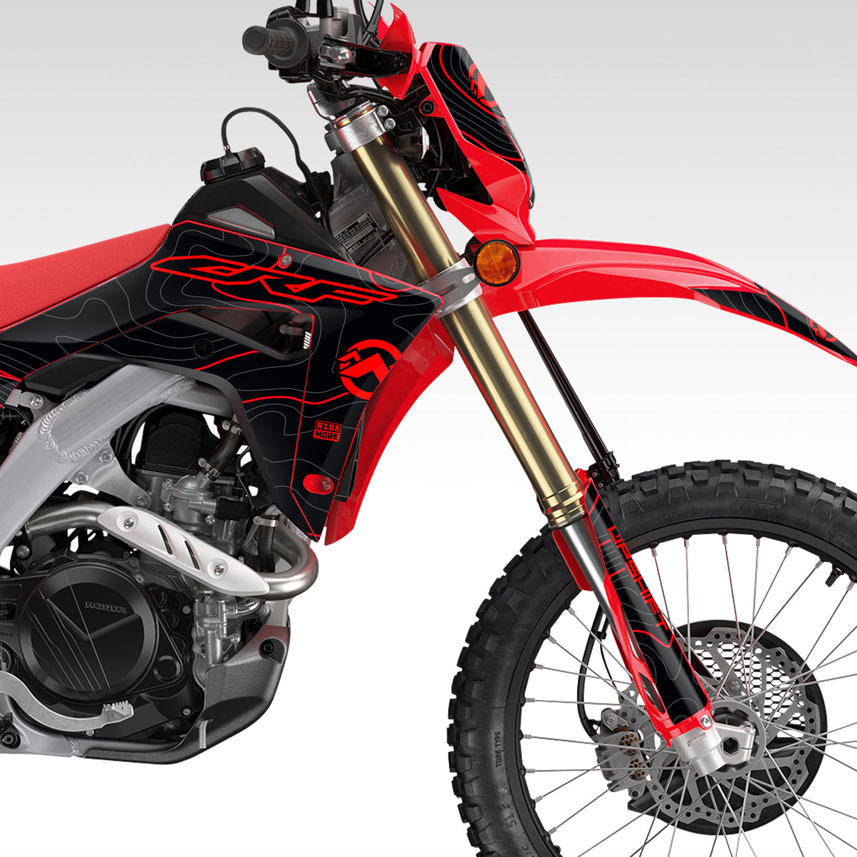 Front half of a Honda CRF450L / CRF450RL with the Black Red TOPO graphics kit installed.
