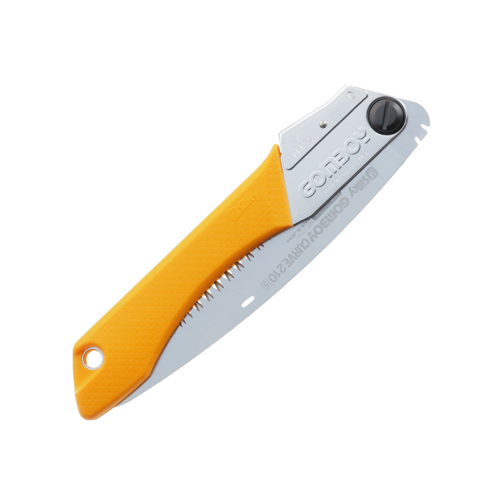 Folded Silky Saws Gomboy Curve 240mm saw. The classic yellow rubber handle with the hardened large tooth blade. Made in Japan. Trail maintenance tools for offroad enthusiasts.